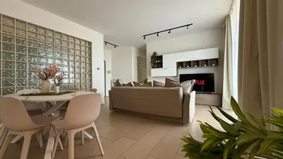 a small bedroom with a bed and a window at Castellammare Residence in Palermo