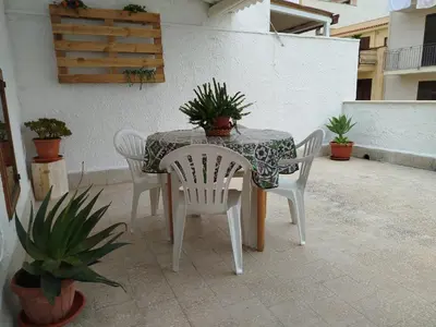 a view of a beach with the ocean at Ocean's Holiday House in Terrasini