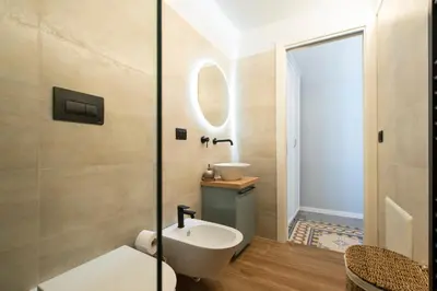 a bathroom with a sink and a shower at Giardino Segreto - Affitta Camere in Castellammare del Golfo