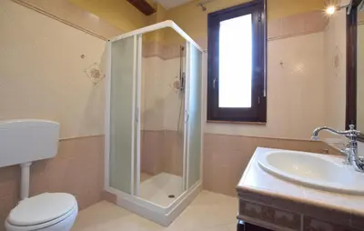 a bathroom with a shower and a toilet and a sink at Beautiful Home In Altavilla Milicia in Altavilla Milicia