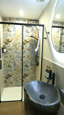 a bathroom with a sink and a shower at D'Halya 57 in Palermo