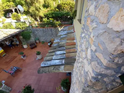 an overhead view of a stone wall with a pathway at Rifugio panoramico in Montelepre