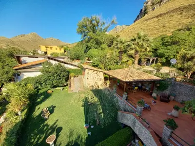 an aerial view of a house with a garden at Rifugio panoramico in Montelepre