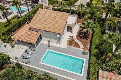 an overhead view of a house with a swimming pool at Villa with private Pool in Castellammare dei Golfo in Castellammare del Golfo