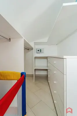 an attic room with a staircase and a desk at Villa with private Pool in Castellammare dei Golfo in Castellammare del Golfo
