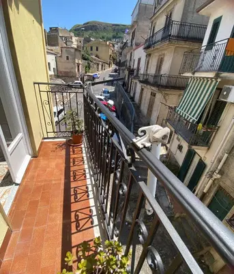 a view of a street from an apartment balcony at La Casa del Sole in Corleone