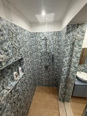 a bathroom with a shower and a sink at La Dimora del CAPO in Palermo