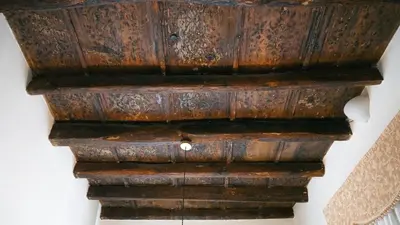 an old wooden cabinet in a room at Antica Palermo R&B in Palermo