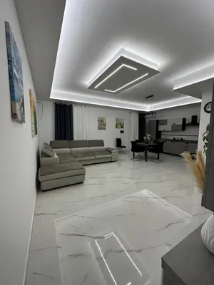 a large living room with couches and a table at Vitale House in Borgetto