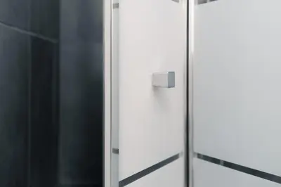 a glass door with a metal handle on it at MojoCoHouse in Palermo