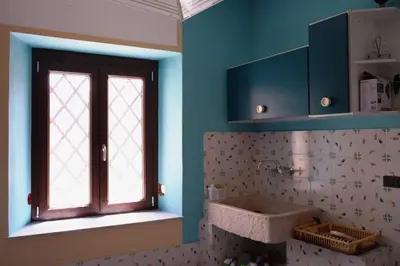 a bathroom with a sink and a window at Casa Tramontana Ospitalità Diffusa in Castronuovo di Sicilia
