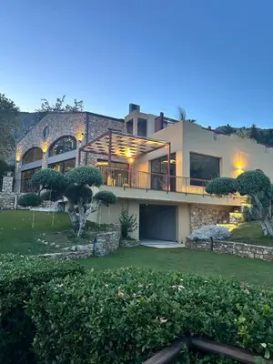 a large house with a large yard at Agrirelais Principe SPA in San Giuseppe Jato