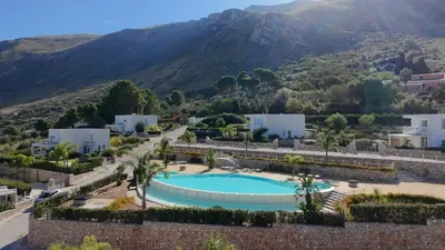 arial view of a resort with a swimming pool at Giardino degli Allori, Villa Manfredi with Pool in Castellammare del Golfo