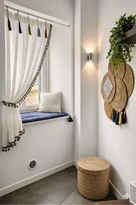 a window seat in a room with a curtain at Dimora Al-Noor in Palermo
