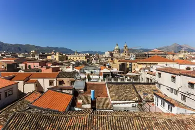 a view of a city with roofs and buildings at Palermo Centro Le Cupole della Felicissima in Palermo