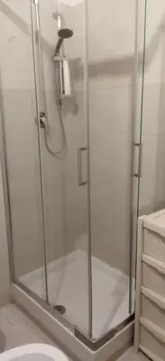 a shower with a glass door in a bathroom at LA CASA DI ALISIA Palermo Centro in Palermo