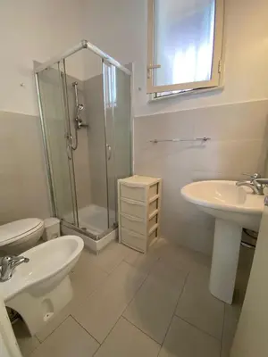 a bathroom with a sink and a shower and a toilet at LA CASA DI ALISIA Palermo Centro in Palermo