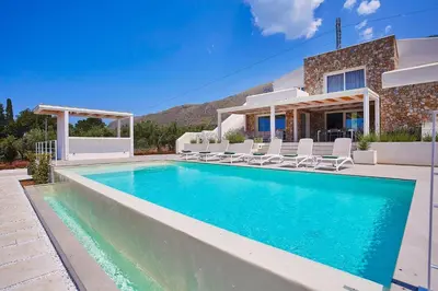 a swimming pool in front of a villa at Villa Allegra in Castellammare del Golfo