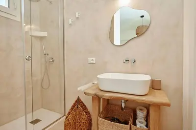 a bathroom with a sink and a shower at Villa Allegra in Castellammare del Golfo