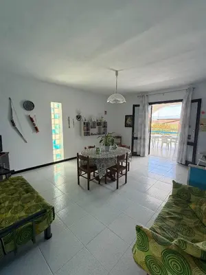 a living room with a table and a couch at 