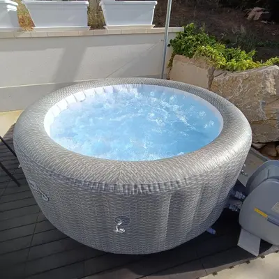 a large wicker tub sitting on a deck at Villa Mare Luna in Balestrate