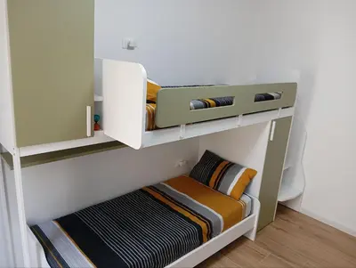 a small room with a shelf with a towel at The Junction in Palermo