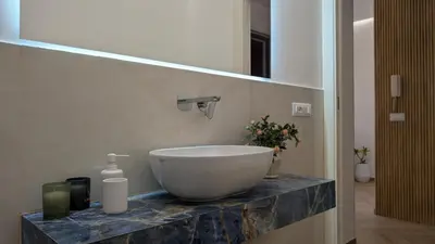 a bathroom with a bowl sink on a counter at Mondello D'Amare in Palermo