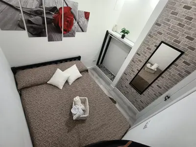 an overhead view of a bedroom with a bed at Summer House in Isola delle Femmine