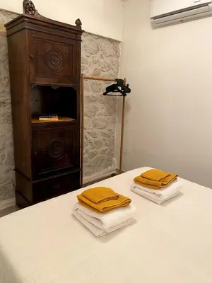 two towels are sitting on top of a bed at La Casetta di Fortunata in Palermo