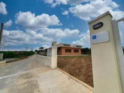 a building with a sign on the side of a road at Apartment MareLuna by Interhome in Balestrate