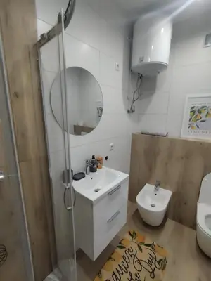 a bathroom with a shower and a sink and a toilet at Da Pietro in Carini