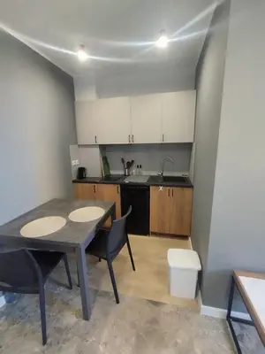 a kitchen with a table and chairs in a room at Da Pietro in Carini