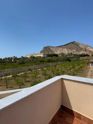 a balcony with a view of a mountain at Case Vacanze Villa Parisi in Bagheria