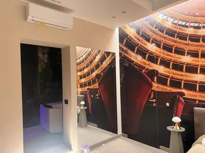 a room with a wall mural of a theatre at Lolli Boutique & SPA Al Massimo in Palermo