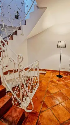 a room with a staircase and a floor at Domus Dea in Mondello