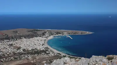 an aerial view of a small island in the ocean at Jecko Apartment in San Vito lo Capo