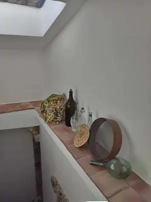 a counter with a mirror and other items on it at Antica Dimora Vaglica in Palermo