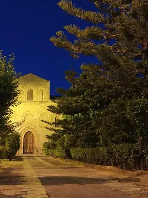 an old church with a tree in front of it at Casuzza del genio in Palermo
