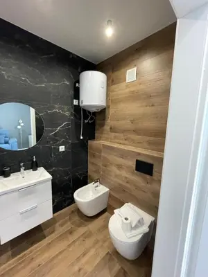 a bathroom with a toilet and a sink at Vento di Sicilia in Carini