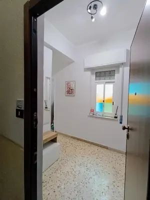 a door leading into a room with a window at Casa Hyccarina in Carini