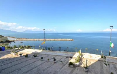 a view of the ocean from a balcony at Cozy Apartment In Trappeto With Wifi in Trappeto