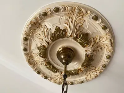 a gold chandelier hanging from a ceiling at Charming Historic Villa in Vita, Sicily - Your Home Away from Home in Vita