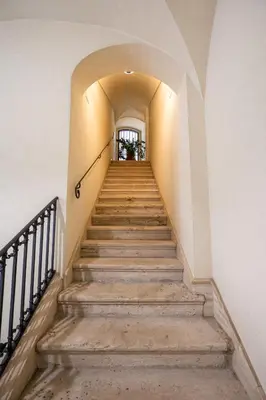 a staircase leading up to a building at Artista Apartment in Alcamo