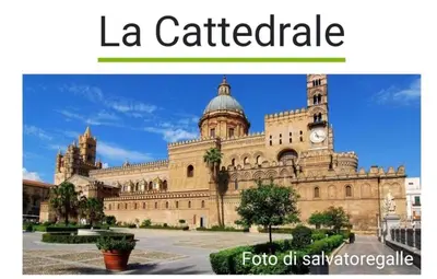 a large building with a clock tower on it at Corte Panormus in Palermo