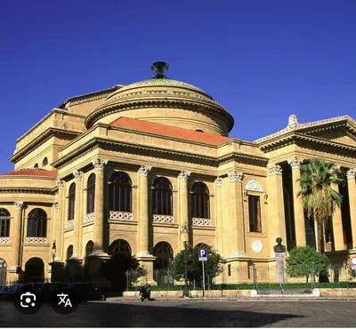 a large building with a dome on top of it at Terrazze al centro in Palermo