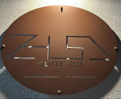 a building with a pool of water in front of it at Zisa Suite 2 in Palermo