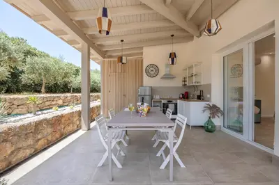 a kitchen and dining room with a table and chairs at 14th Oasis Family Room In Villa With Pool Near Palermo in Carini