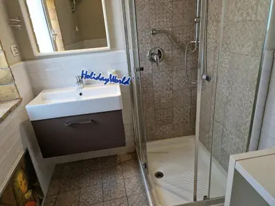 a bathroom with a sink and a shower at Il Fico d'India by Holiday World in Palermo