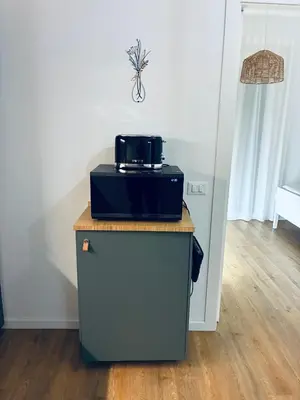 a kitchen with a sink and a counter top at Disíu Apartment con jacuzzi in pieno centro in Castellammare del Golfo