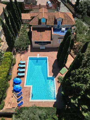 an aerial view of a house with a swimming pool at VFH Villa Cala del Cuore con piscina, 50 m dal mare in Santa Flavia